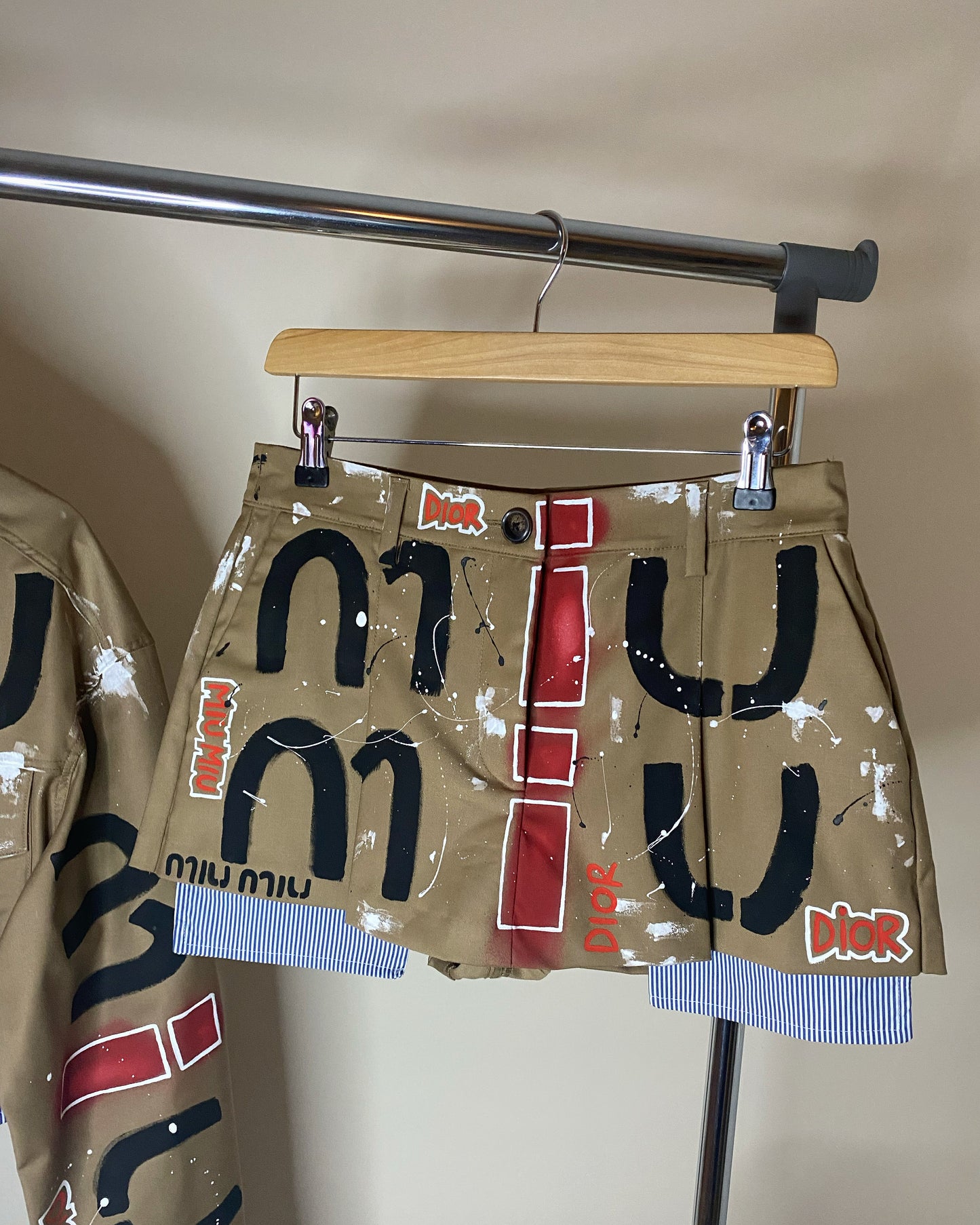 zMUIGRAFFITI’ skirt and jacket set.