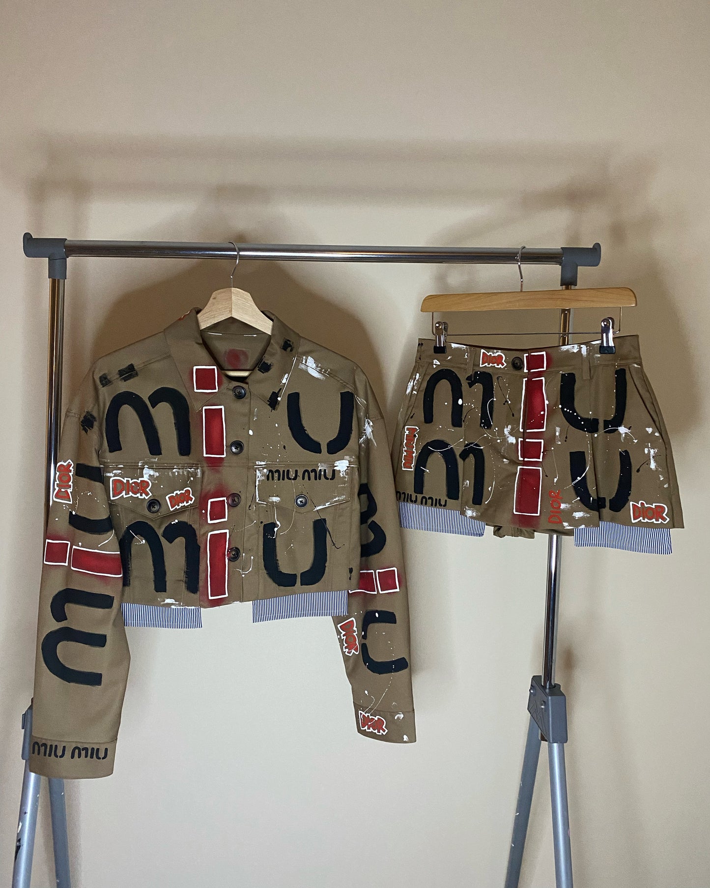 zMUIGRAFFITI’ skirt and jacket set.