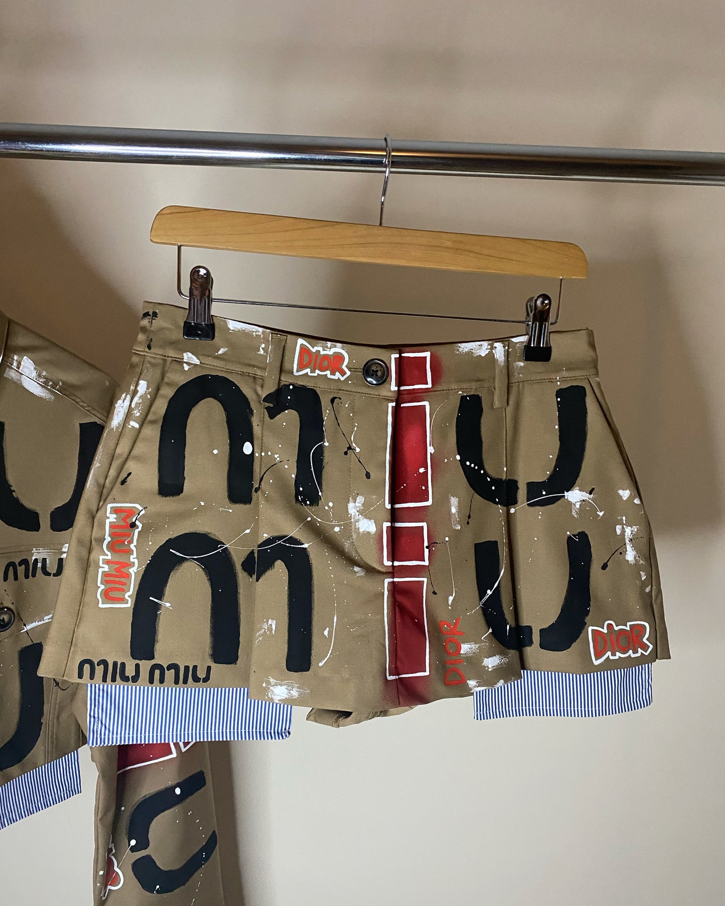 zMUIGRAFFITI’ skirt and jacket set.