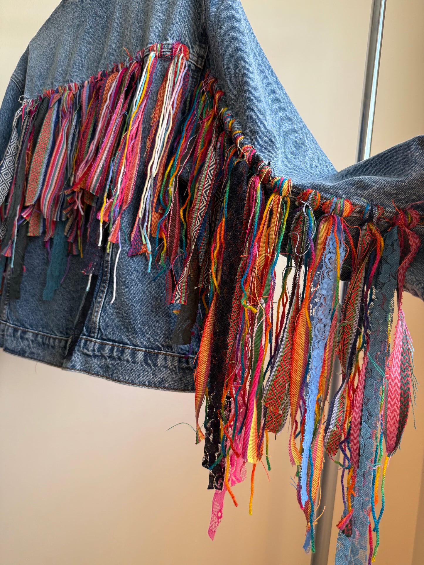 aTassleBoho’ adults denim jacket