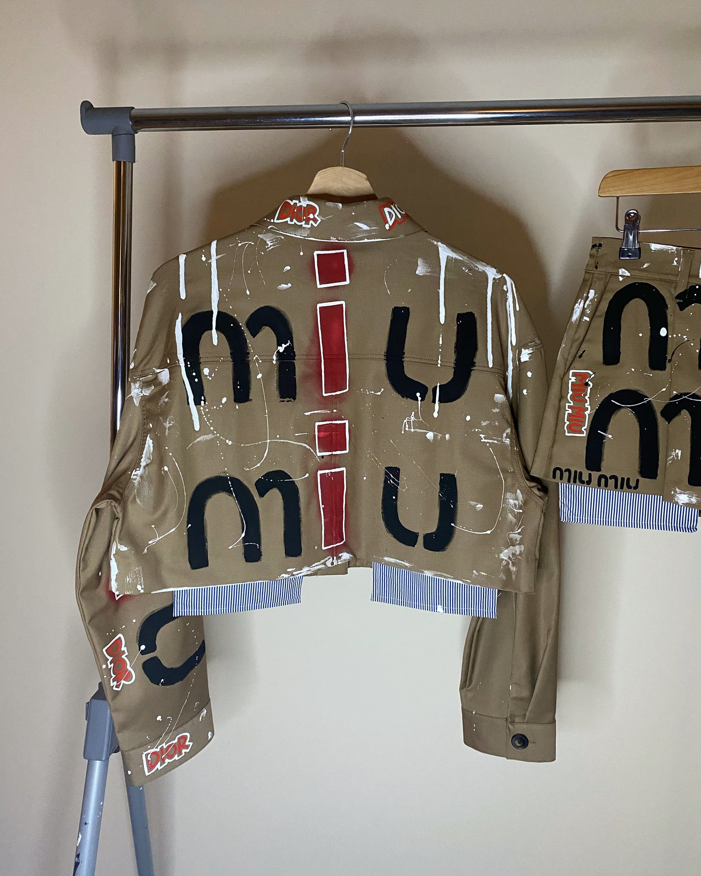 zMUIGRAFFITI’ skirt and jacket set.