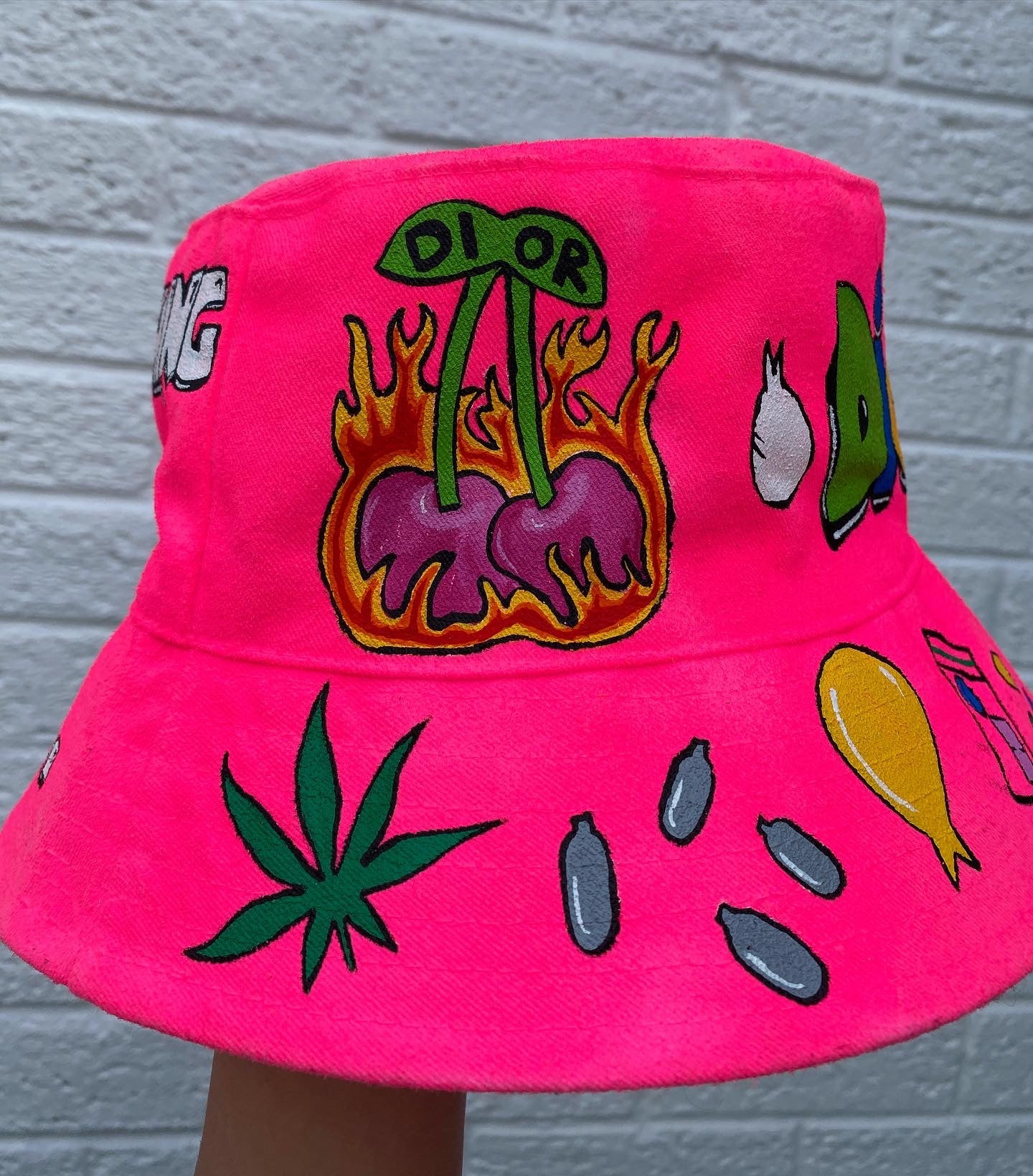 ‘zzBABYS NOTHING BUT A..’ bucket hat