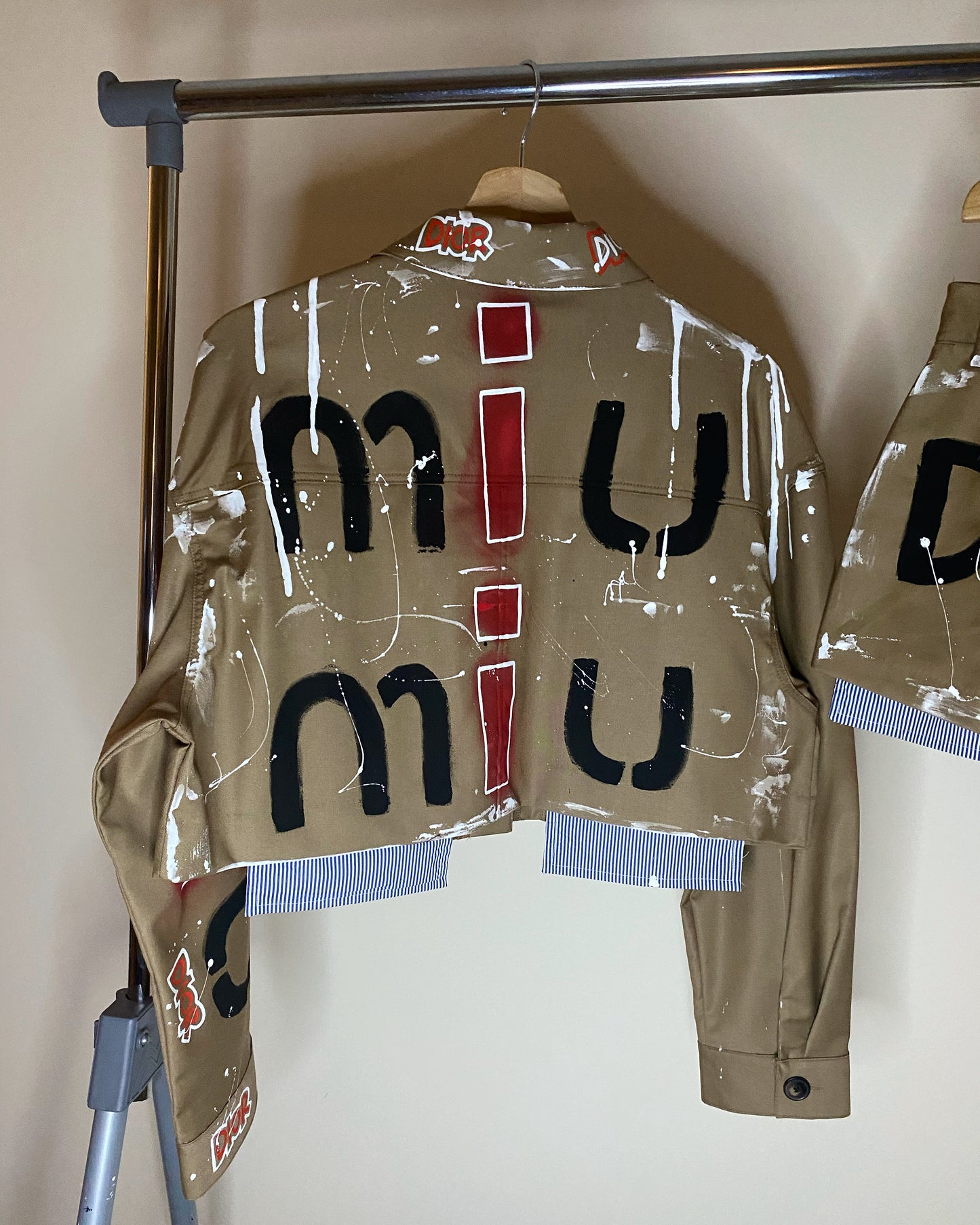 zMUIGRAFFITI’ skirt and jacket set.