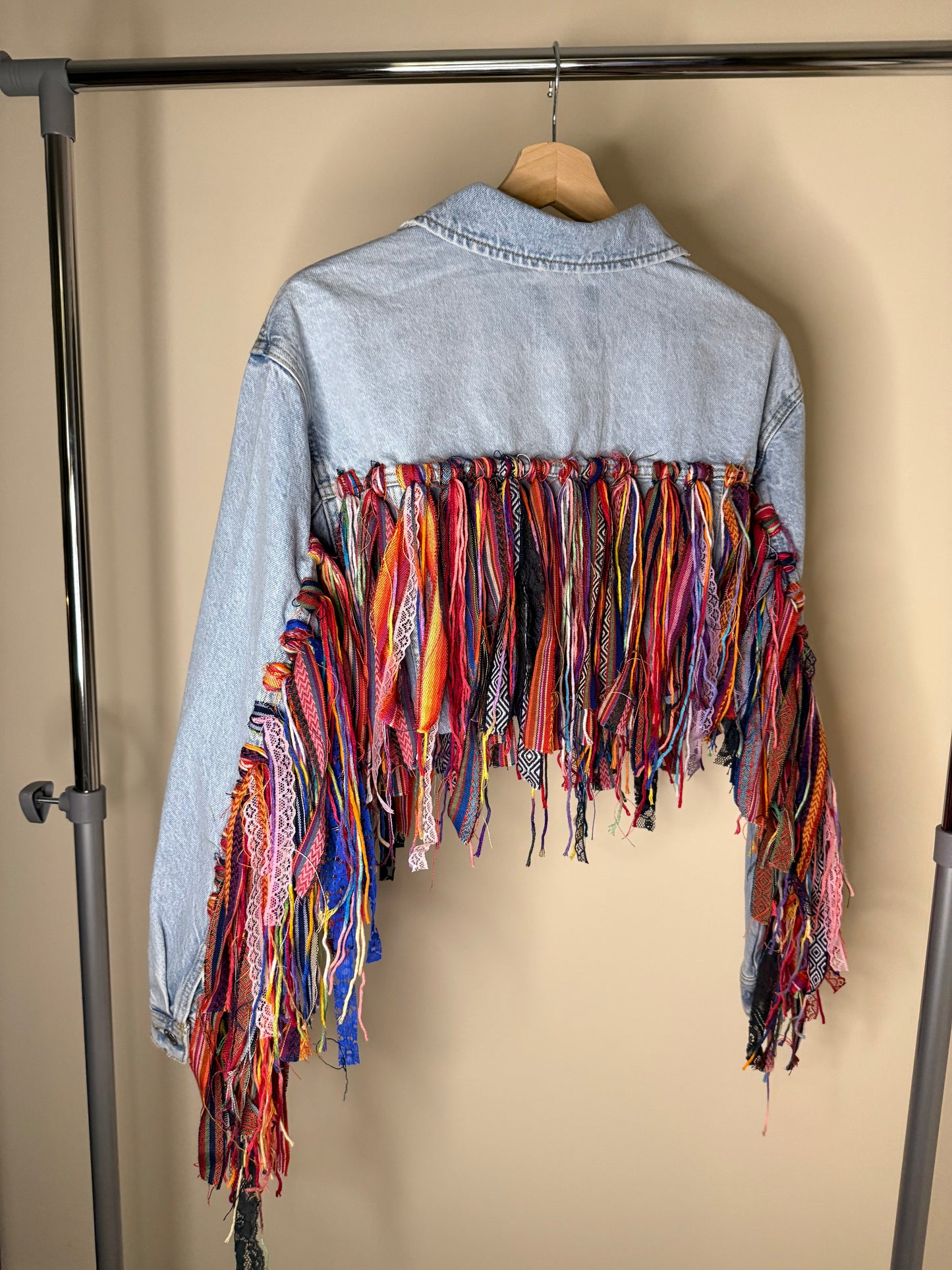 aaaTASSELBoho’ cropped denim jacket
