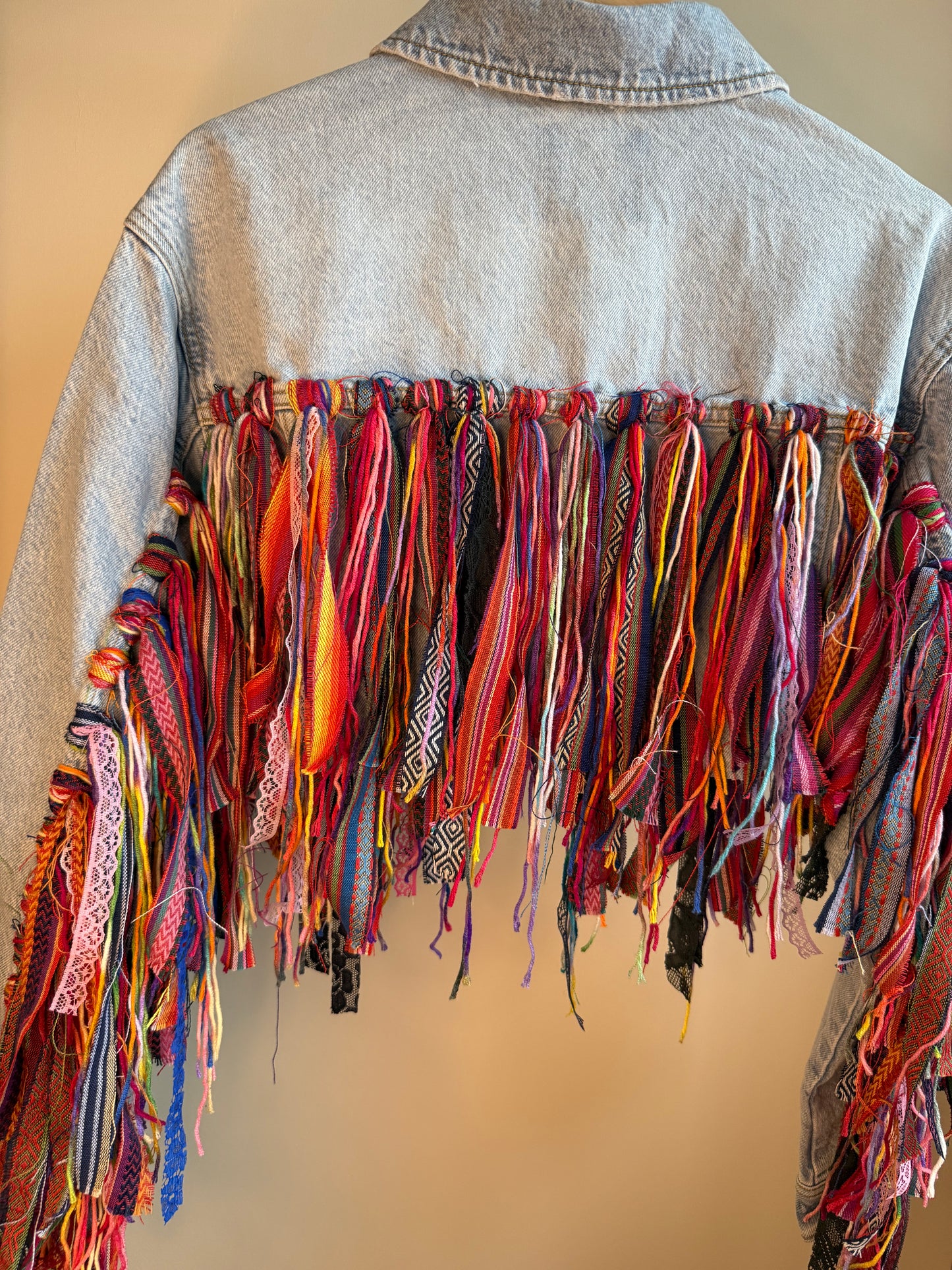 aaaTASSELBoho’ cropped denim jacket
