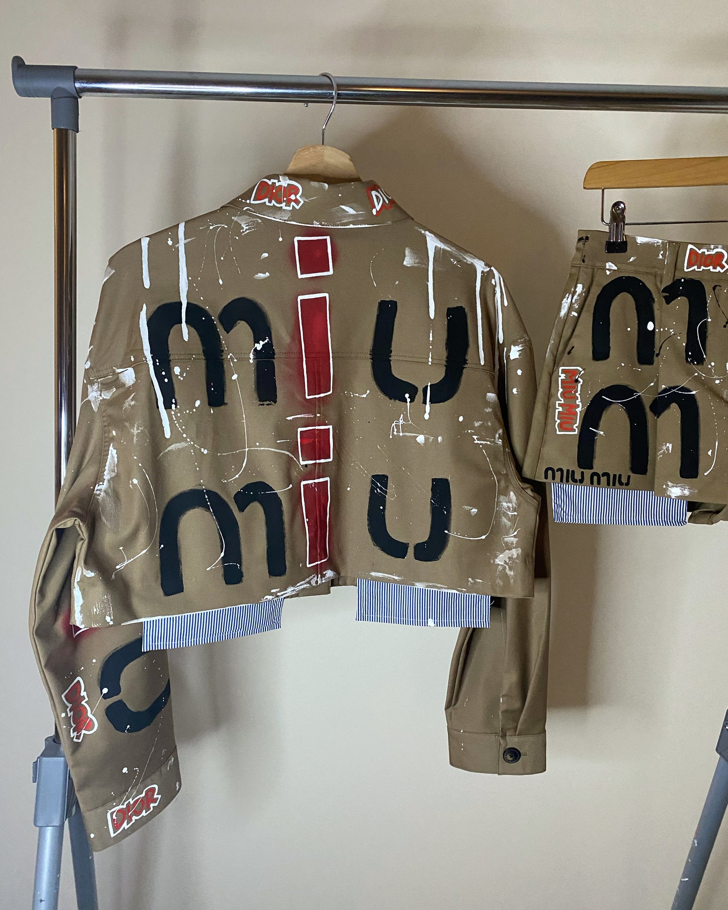 zMUIGRAFFITI’ skirt and jacket set.