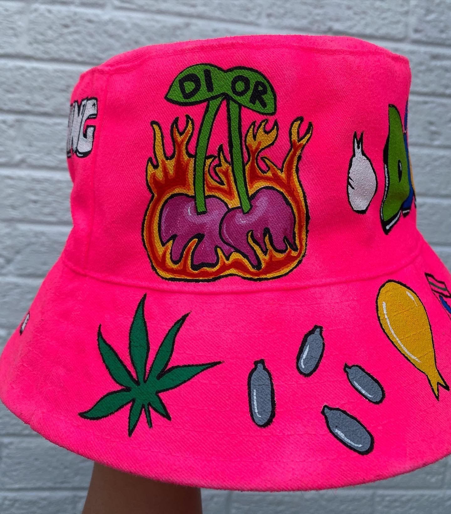 ‘zzBABYS NOTHING BUT A..’ bucket hat