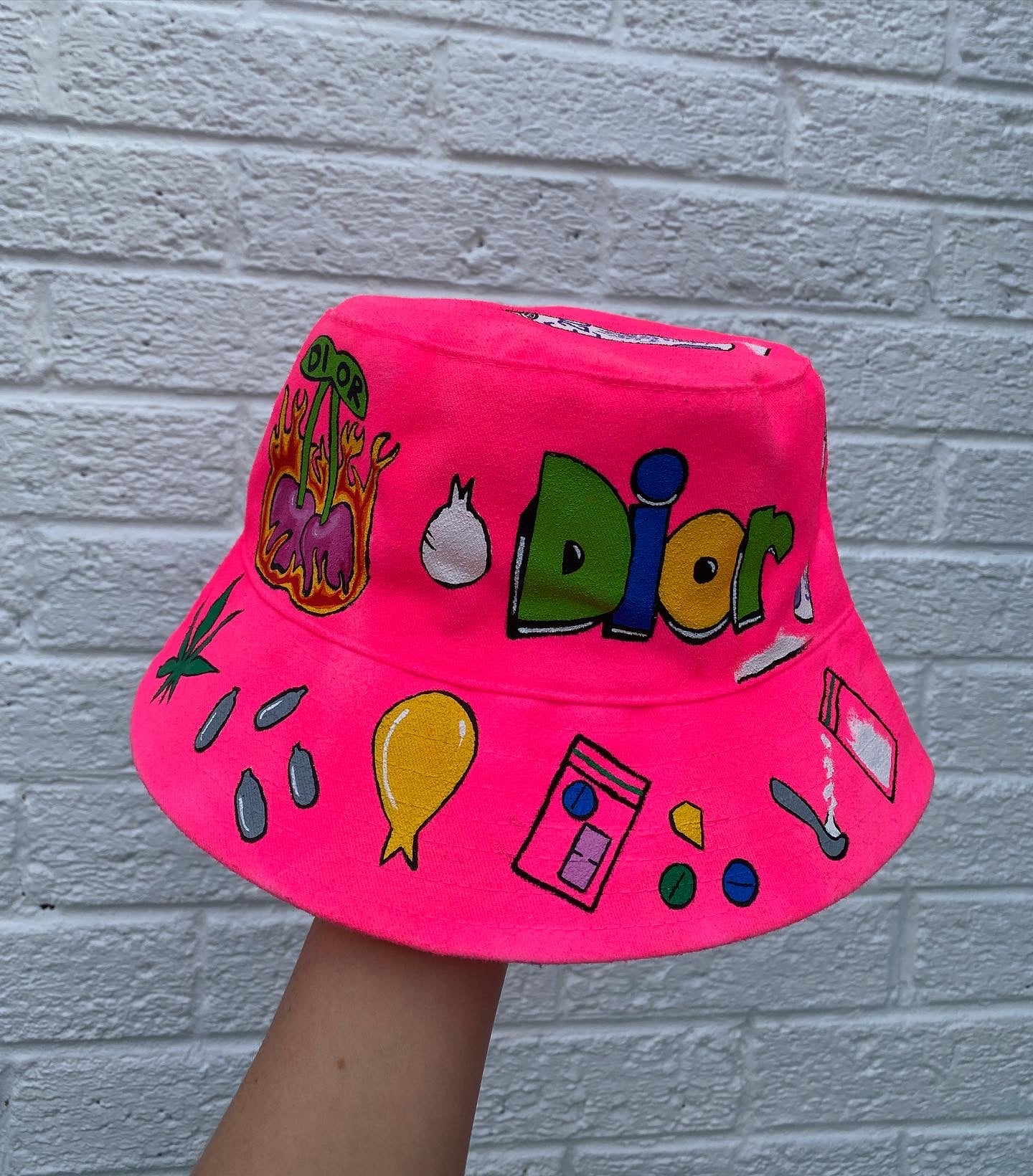 ‘zzBABYS NOTHING BUT A..’ bucket hat